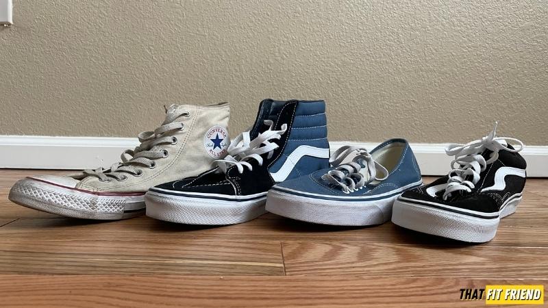 All black vans outlet or converse