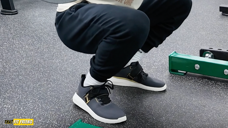 STRIKE MVMNT EZ Lifter On Feet for Squats